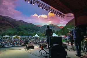 Outdoor Telluride concert surround by a scenic wonderland. Photo courtesy of Telluride Ski Resort/Ryan Bonneau.