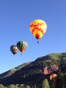 Hot air ballooning in Telluride during a lush green summer. Photo by Beth Buehler.