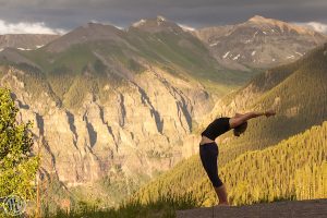 Yoga in Telluride at the top of the free gondola with beautiful mountains as the backdrop.