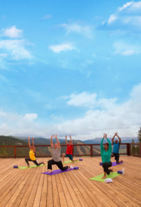 Mountain top yoga with a spectacular view. Courtesy Keystone Resort.